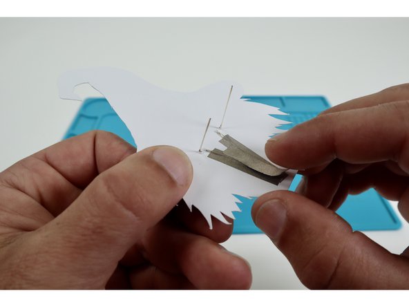 Peel and stick the last piece of Maker Tape as shown in photo three.