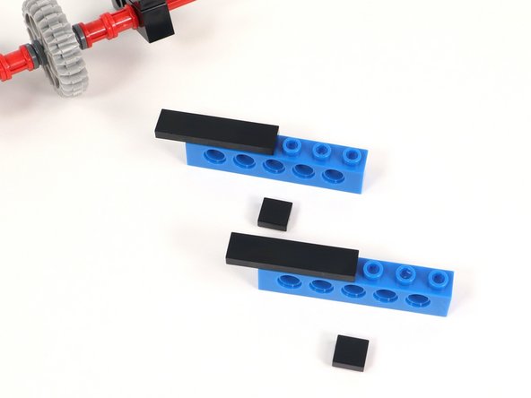 Add a 1x1 tile on the next open stud of each brick.