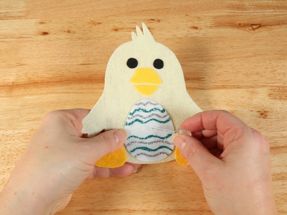 Add the LED by pushing the legs through the holes.