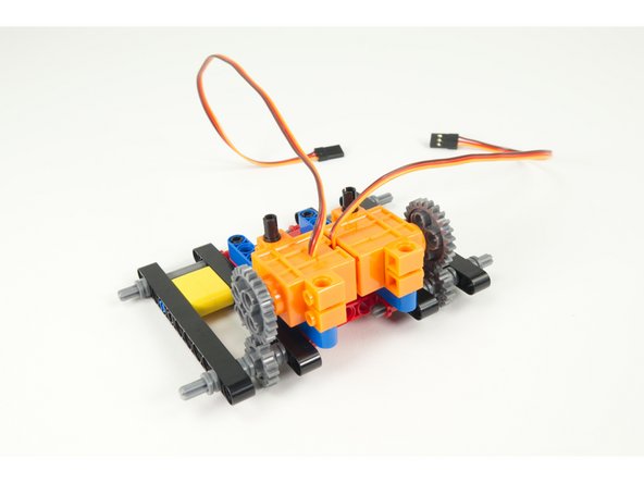 Add the second (right side) servo to the frame.