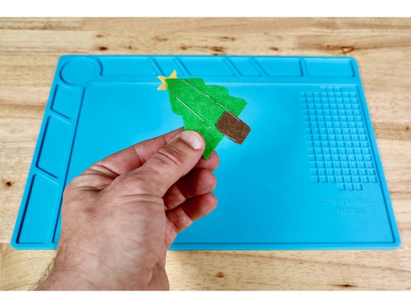 Notice that the LED legs are not the same length. For ease of use with our other instruction sets, thread each LED through a give pair of vertically oriented holes from the front to the back. Take care to orient the LEDs so that the LONG (+) legs are in the UPPER holes and the SHORT (-) legs are in the LOWER holes.