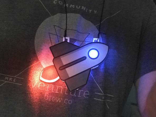 Add some string to the holes on the top tabs.