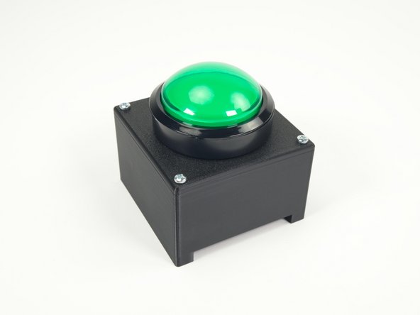 We've now got the top cover in place so we can add the arcade button.