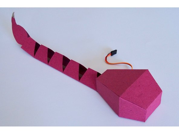 Glue the back on to ScorpioBot, sealing the body up.