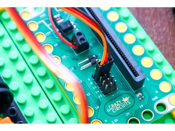 Connect the continuous rotation servo to Pin 0.