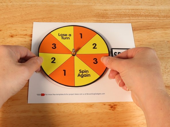 Press down on top of the template to adhere the top layer to the foam tape.