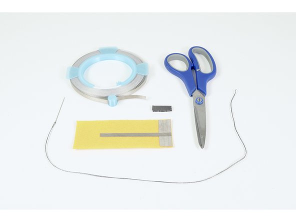 Gather the materials shown: Conductive Thread/Needle, Scissors, 1/4&quot; MakerTape and your Conductive Hook &amp; Loop material.