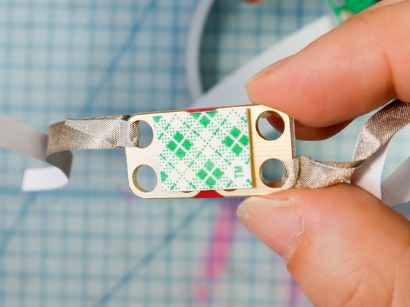 Add foam mounting tape to the back.