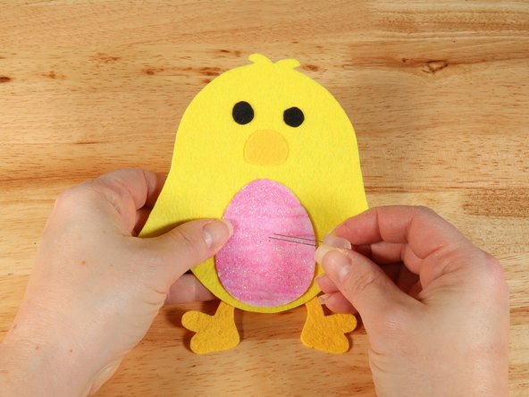 Add the LED by pushing the legs through the holes.