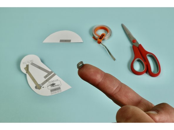 The Tape Loop should be about half the diameter of the Battery. (You can use the battery outline circle as a guide.)