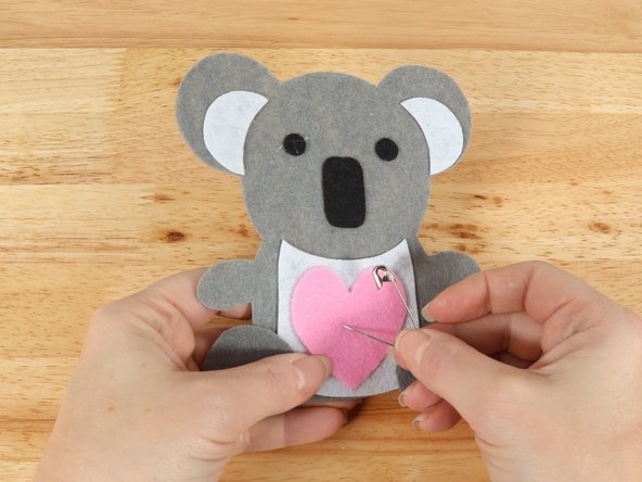 Use a safety pin or a push pin to poke two holes through the felt for the LED legs to go through.