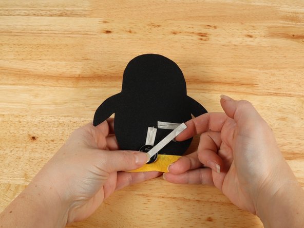 Add Maker Tape to connect the top (Positive) side of the battery to the Positive LED leg path.