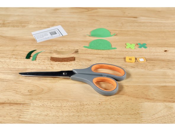 Lay each template piece atop the felt. Pinch both together and cut through both. You CAN also cut each template first (on the borders), trace them onto felt and cut just the felt afterward if it's easier for you.