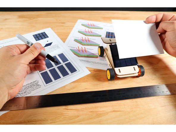 Use an index card to gradually shade the panel from one edge to the edge across from it to find the point at which the panel no longer supplies enough electricity to make the motor work. Shade that area on the appropriate diagram for Day 1  Activity 4. Repeat this procedure from the remaining edge to edge (perpendicular to the first trial).