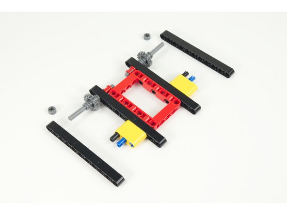 We'll need to temporarily remove the half-size bushing we added in Step 5 so we can add the outside beams.