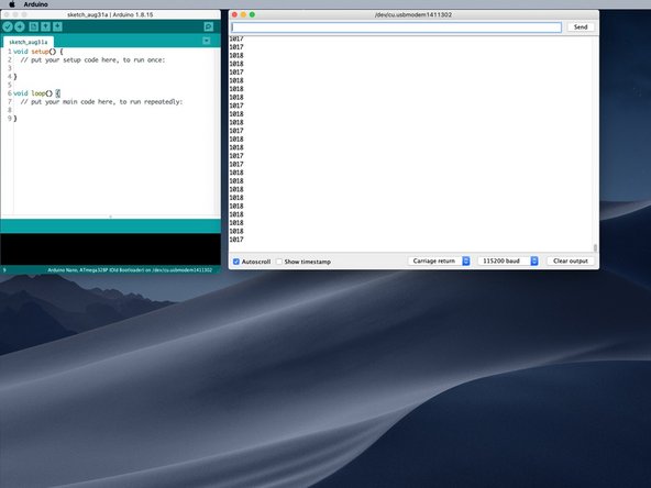 Set the baud rate to 115200 baud in the bottom right corner of the Serial Monitor window.