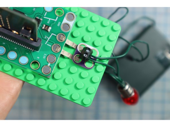 Place the Screw Terminal Chip over the Maker Tape as shown.