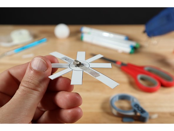 Stick the tape loop atop the part of path "A." that is roughly in the center of the circular portion of the ring template. This will be 1/2 of the system that connects the battery to the rest of the circuit.