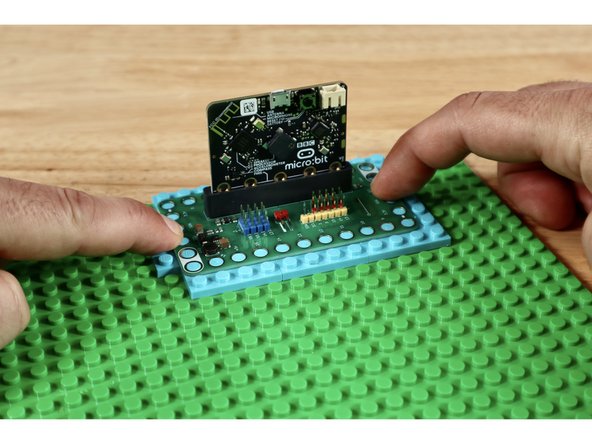 Press your Bit Board into place atop the arrangement of plates as shown.