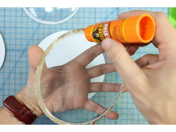 Glue the plastic domes in place with a glue stick.