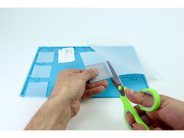 Find your sheet of velum, tracing paper or copy paper and use the gray square to help you cut 4 of the same shape with a scissors as shown.