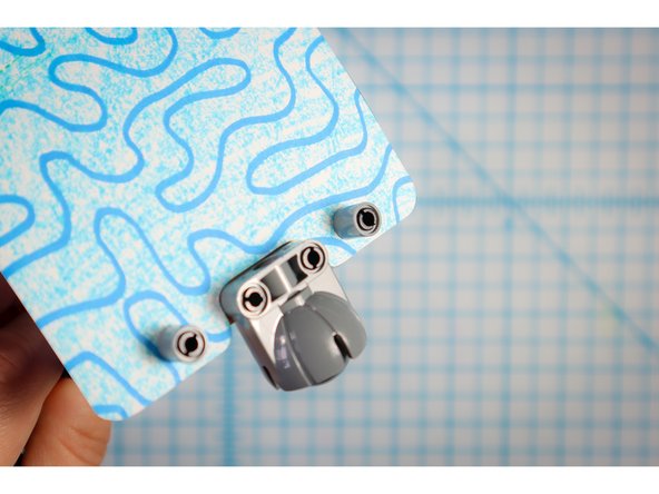 Use two pin/beam sets to connect the back to the Rover.