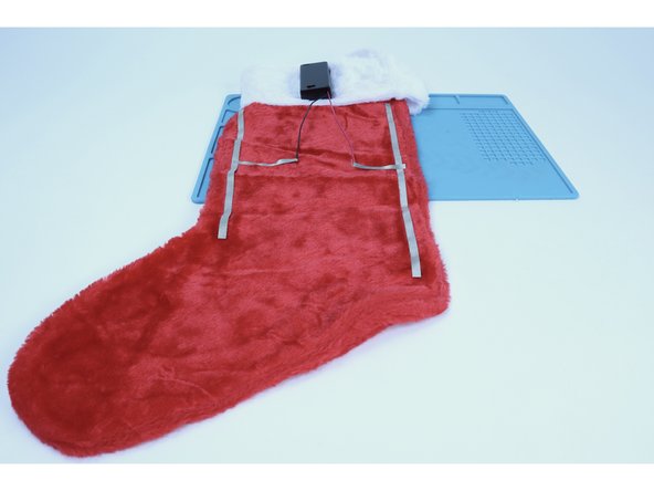 Measure and cut two pieces of Maker Tape that are about 3-4&quot; long.