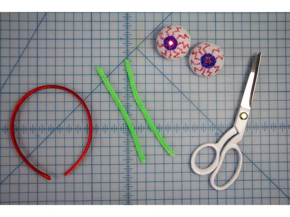 Fold it in half, then cut it into two equal pieces.