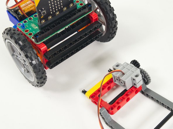 Attach the Lifter to the lower beam on the front of the Rover.