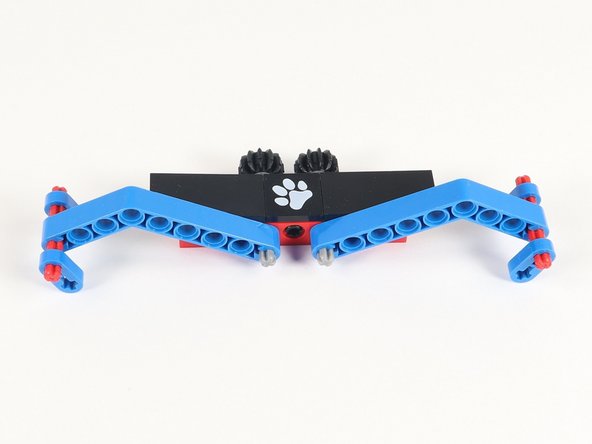 There are two different build options for the arms. With the pieces you have you can build both options and change them up as you would like. Option 1 has the black bent beams and Option 2 has the blue bent beams.