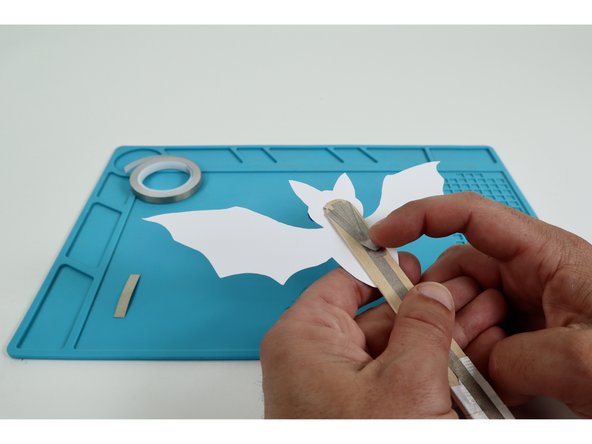 Stick the remaining Maker Tape path down as shown in photo three.