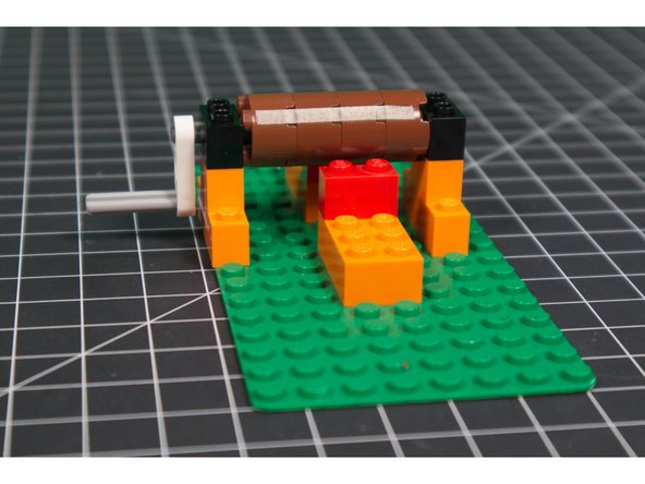 Notice the position of the cylinder in relation to the bricks on the base. We need the cylinder to be able to make contact with the tape we'll be adding.