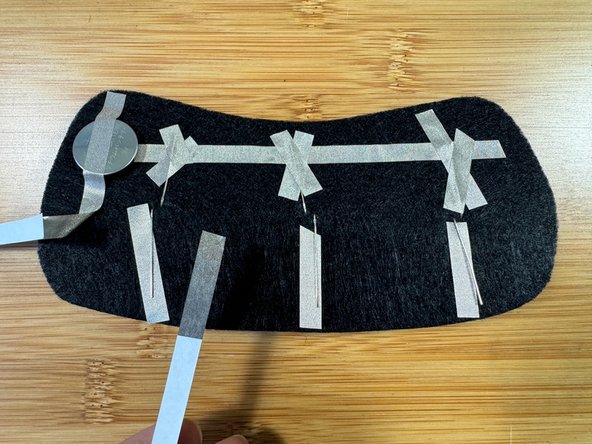 Add a &quot;tail&quot; of tape to each of the three LED legs by removing the backing from only the first inch of tape and sticking it in place on top of the LED leg.