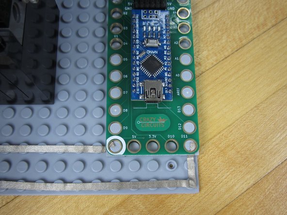 Run Tape from Ground on the Robotics Board to the Ground on the LED Tape.