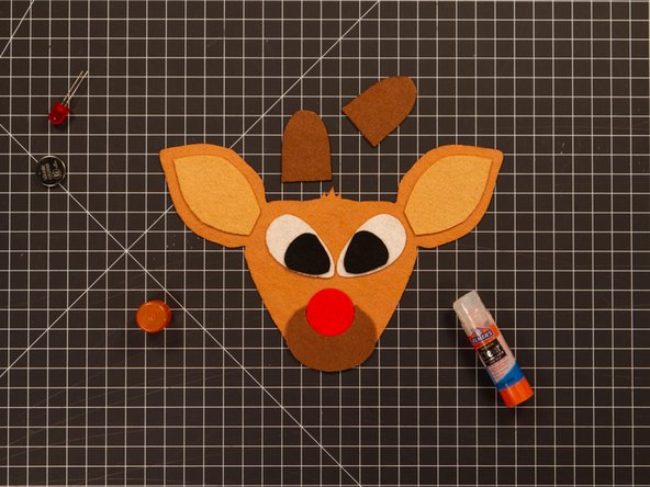 Finally, let's get that red nose in place! It fits right into the rounded out section of the muzzle.