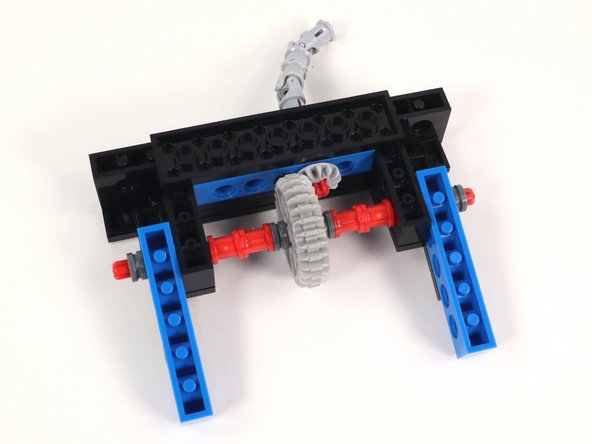 Now that you have connected Section 1 and Section 2 flip the build over and add a 2x8 plate to the bottom center of the build. This will help keep the sections together.