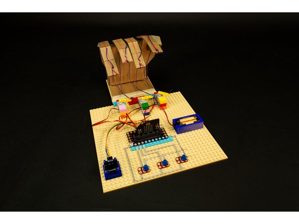 Congrats! You just built a cardboard hand and controlled it with a micro:bit!