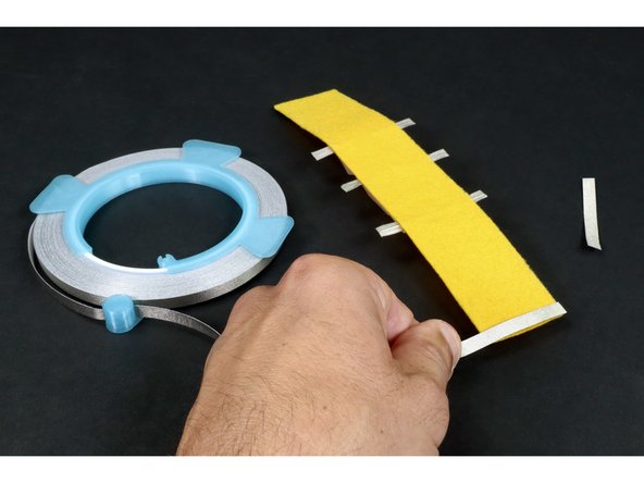Flip your project over. Measure and cut two more pieces of Maker Tape that are the width of the felt.