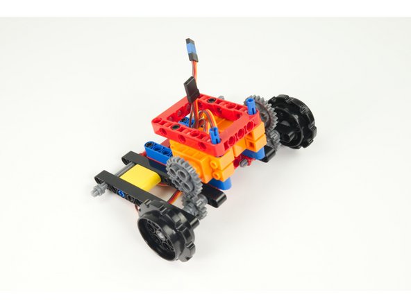 Remember, there should be a half-size bushing already on the axle that the sprocket will slide up against.