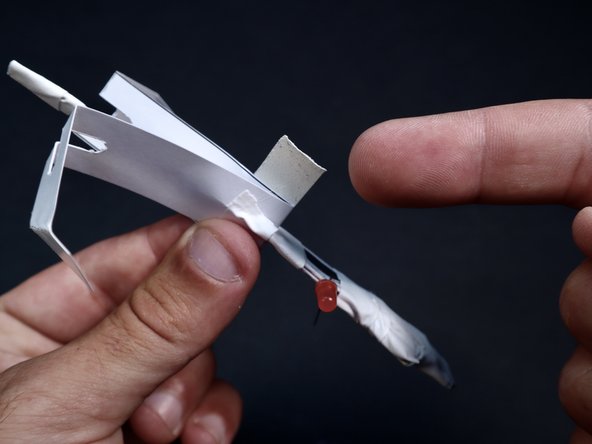 Use the two tape pieces to cinch together the sides of the Rotor Blade around the narrow shaft.