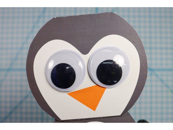 The penguin's eyes are 1.5-inch circles - perfect for a set of Googly Eyes! Add them if you wish.