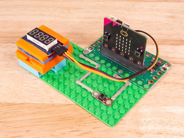 Start by plugging the connector with the three wires in it (Black, Red, Yellow) into the Pin 1 row of the Bit Board. (Make sure the Black wire is in - and the Yellow wire labeled S1 is closest to the number 1 on the Bit Board.) We can then plug the Orange wire labeled S2 into Pin 0 on the Bit Board.