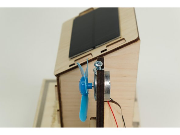 The blade should spin freely. If it does not, make sure you leave a small gap between the fan blade and the motor housing when pressing the blade onto the shaft.