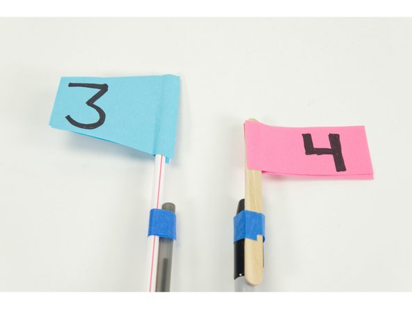 You can use any tape you've got available or you could use rubber bands.