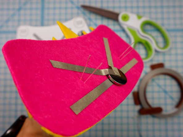 Insert each LED through the holes with the longer, positive leg in the top hole.