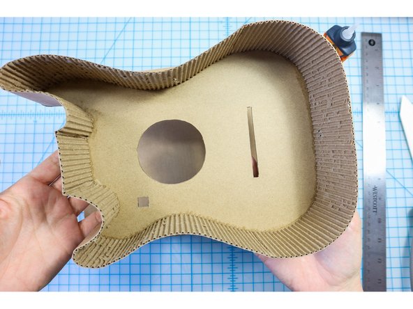 Cut 2.25-inch strips perpendicular to the grain of the corrugation.