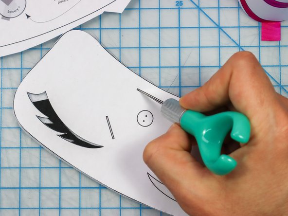 Be sure to cut the slits in the base piece along the template lines as shown.