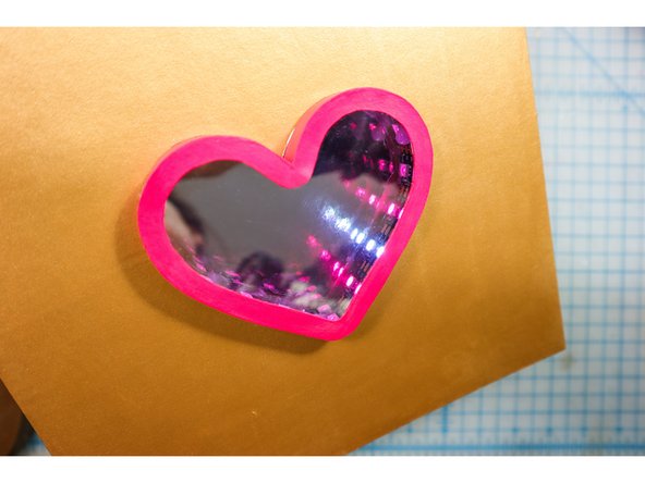 With the heart &quot;beating&quot; with the spinning white light, the 3D effect will make it look infinite!