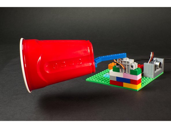 You may want to test the circuit before you attach the cup to the beam, just to make sure you know which orientation you need to place the beam on the servo, and how you want the cup glued in place.