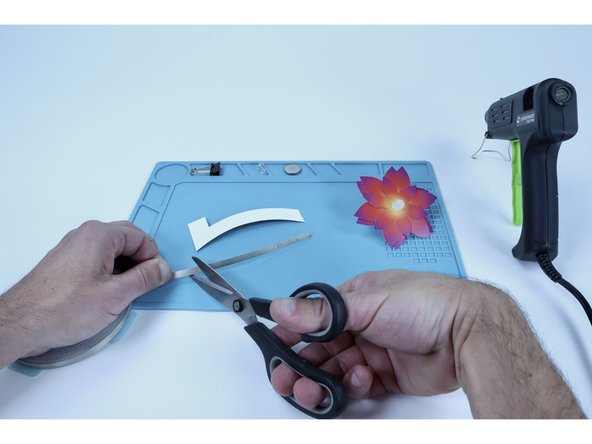 Measure and cut another Maker Tape segment roughly the length of the stem.